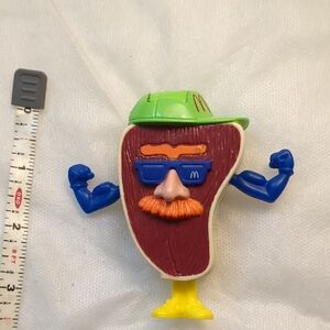 vintage McDonald's happy meal Action Figure "t bone transformer"